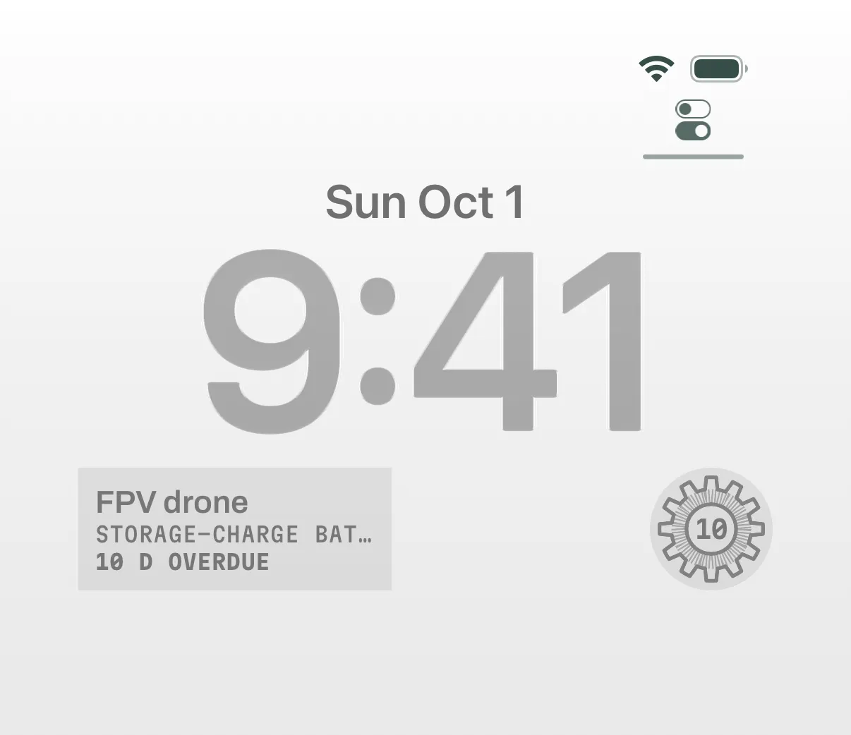 The Lock Screen with GearKit’s rectangular widget, showing the most urgent item and its countdown, and the circular gauge widget.